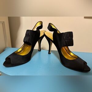 DKNY Elegant Black Women's Heels Elastic Strap and Gold Accents
